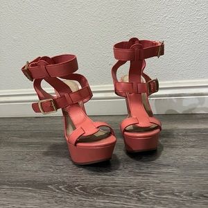Breckelles pink wedge heels